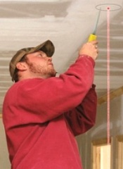 Electricians use this laser level for accurate placement of  lighting fixtures.